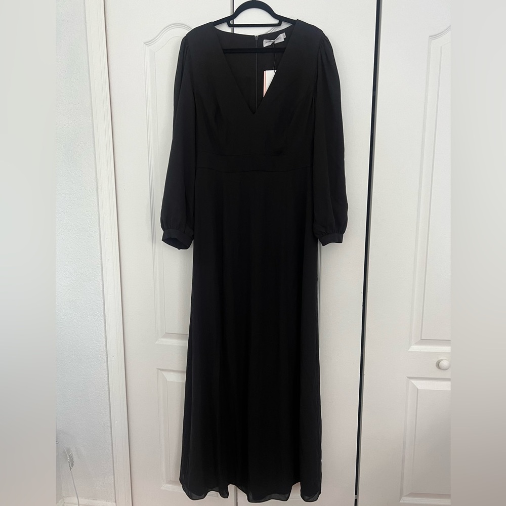 Fame and Partners black formal dress. Long sleeve and v neck. Never worn.